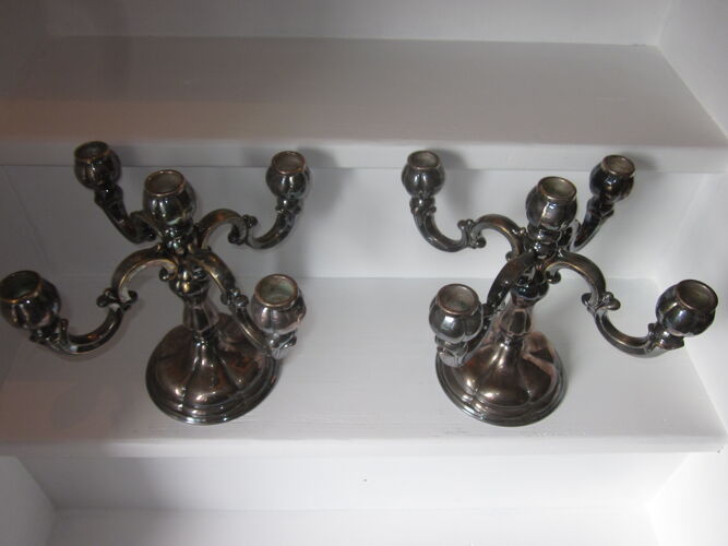 Paire de chandeliers en metal argenté