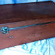 Old vintage black and white cardboard storage suitcase travel