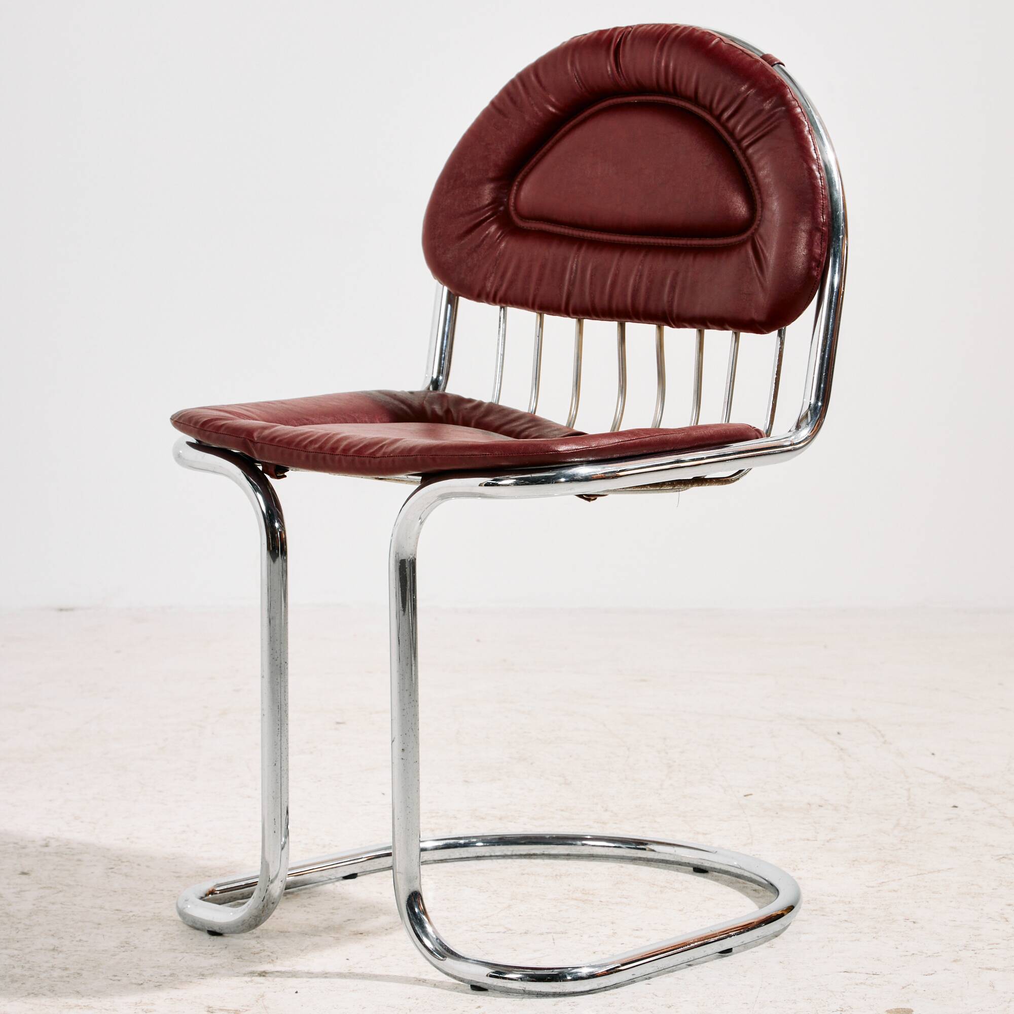 Italian chrome and leather dining set by Gastone Rinaldi, set of 7.