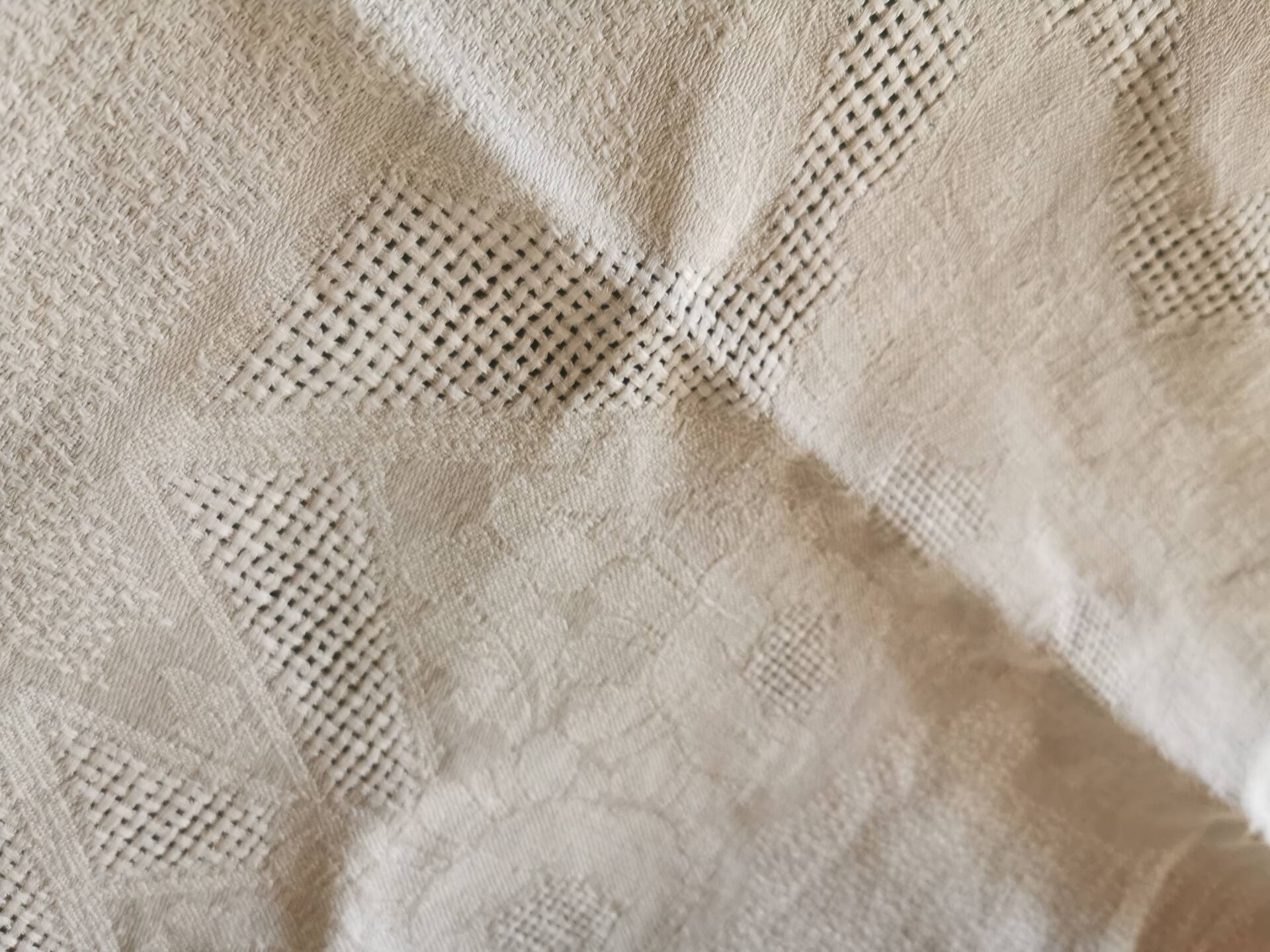 Set of 16 table napkins and an old floral damask tablecloth.