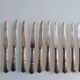 12 silver metal dessert or cheese knives