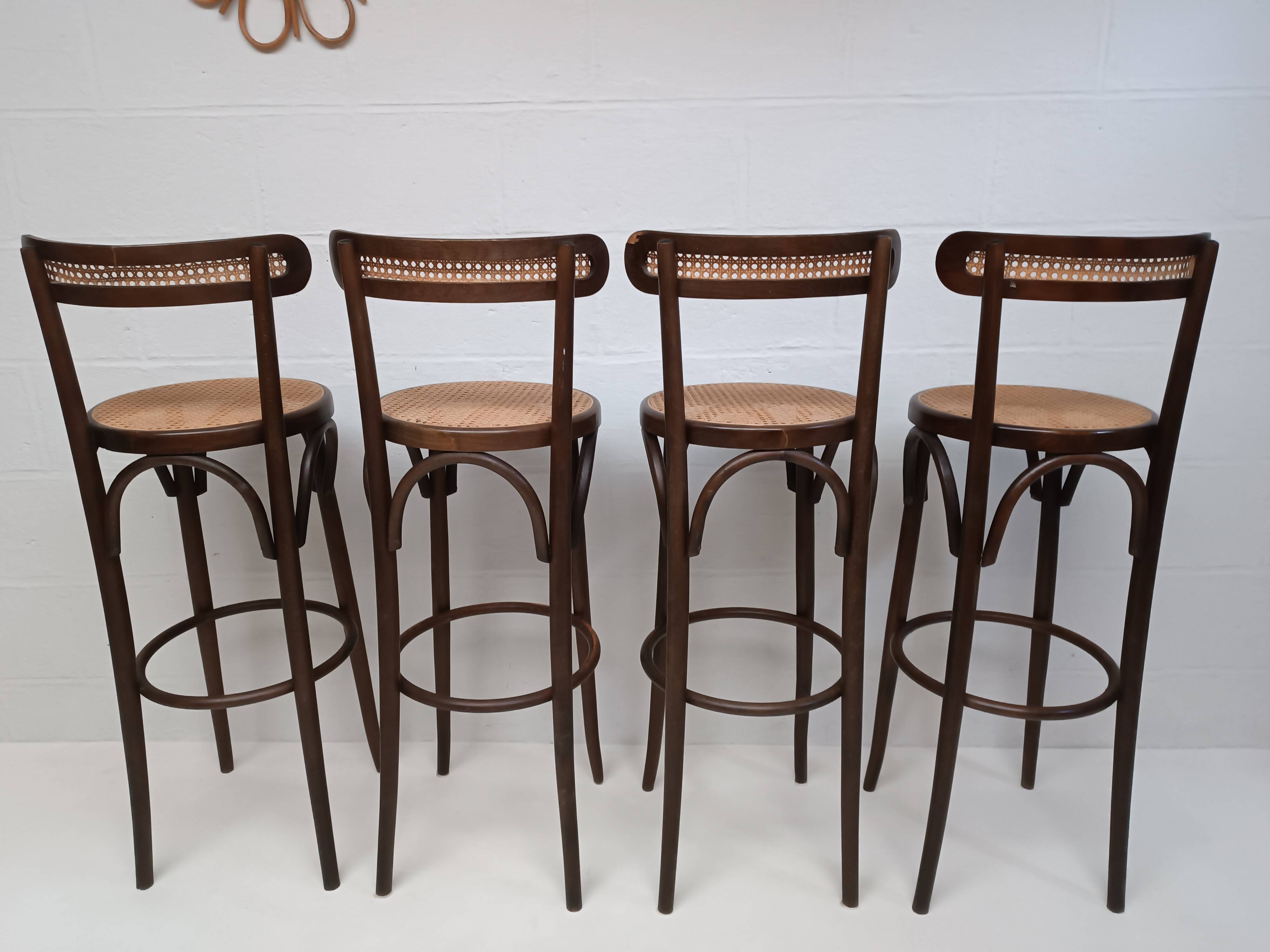 4 curved wood and cane bar stools