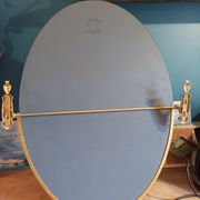 Oval mirror patinated brass frame art deco