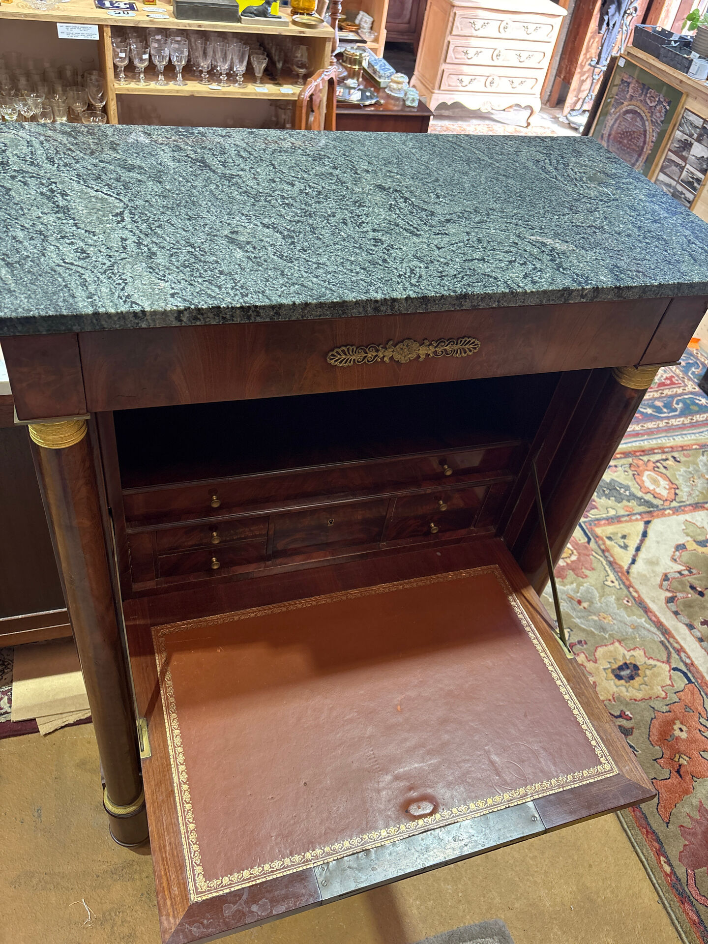 Empire secretary in mahogany, bronze and marble with secret drawers.