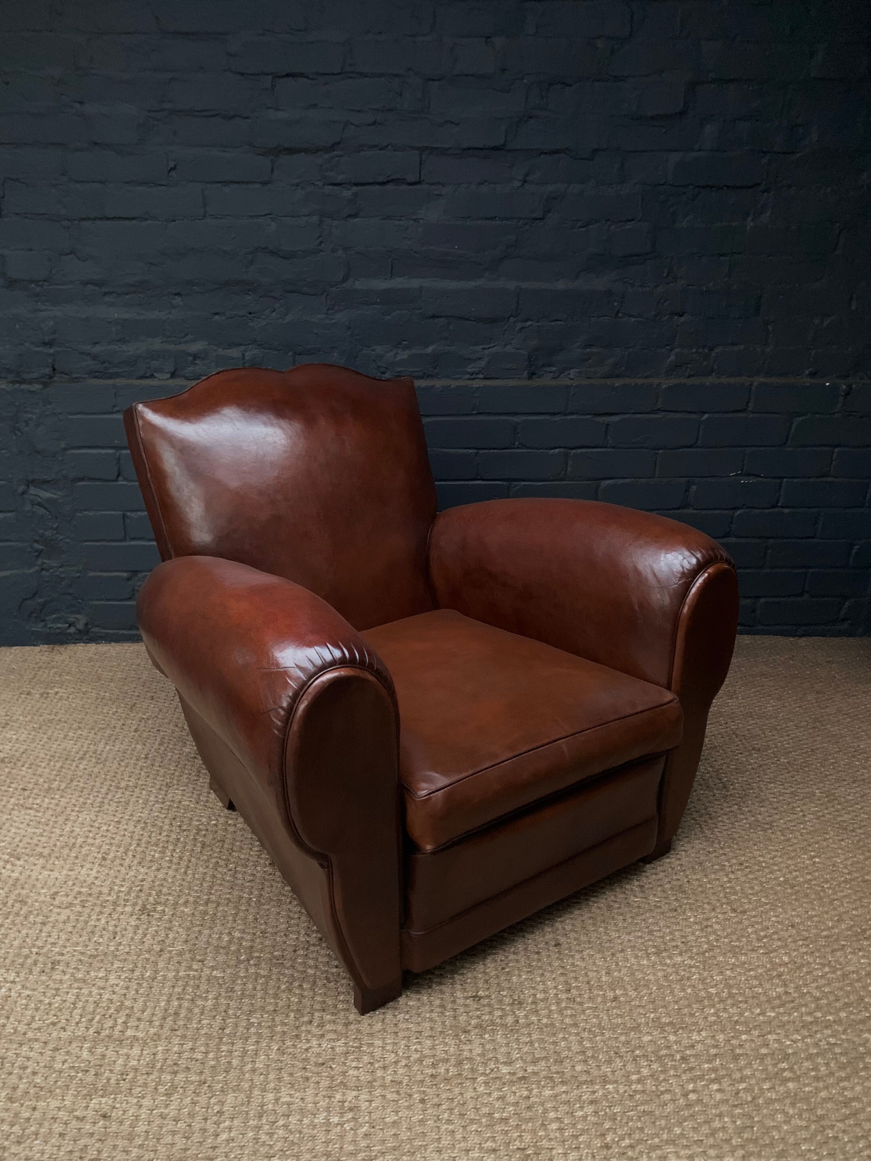 Leather club chair, havana moustache model, with cuban cigar arms, circa 1930's