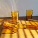 Lot of 4 glasses of amber water