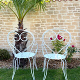 Paire de fauteuils de jardin en fer forgé
