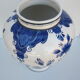 Ceramic vase earthenware, blue floral decoration on a white background