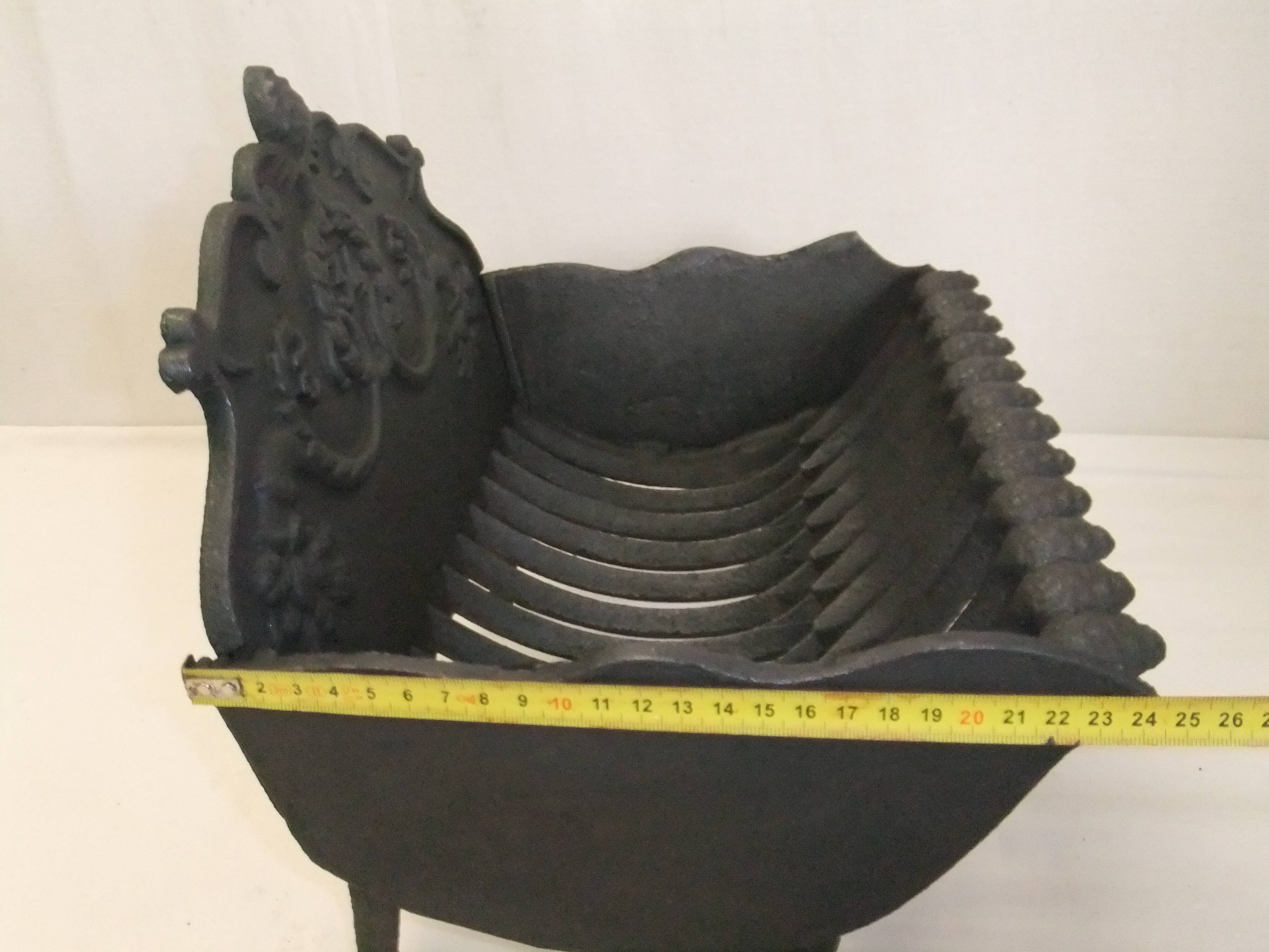 Old cast iron log holder andiron fireplace cornucopia pine cone