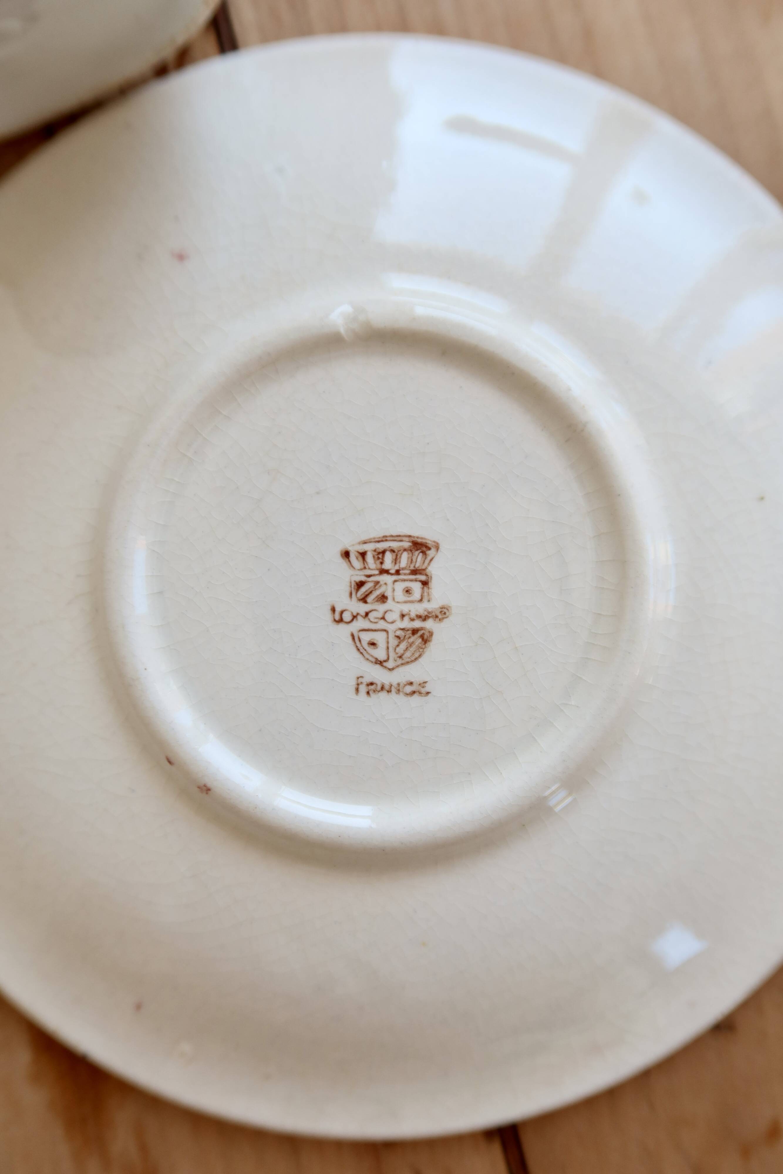 Antique Longchamp ironstone coffee cup with saucer.