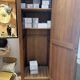 Wooden locker with tubular base