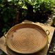 Wicker and brass table centrepiece in the style of Gabriella Crespi from the 1960s.