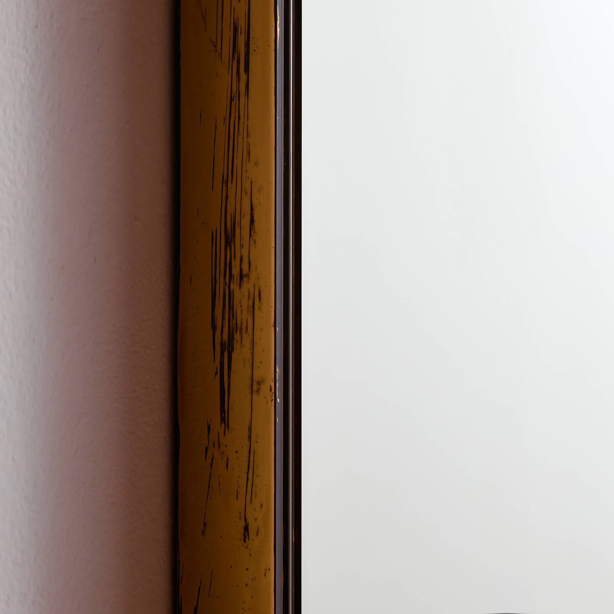 Metal and brass framed mirror