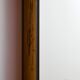 Metal and brass framed mirror