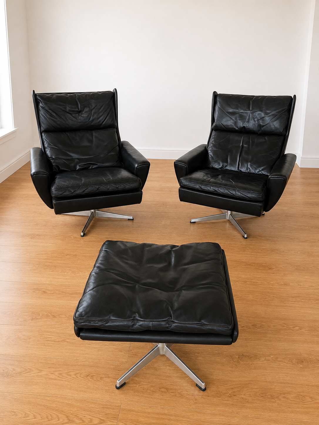 Vintage Danish Georg Thams matching black leather lounge chairs 1970s