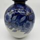 Large Tharaud Limoges vase in cobalt blue porcelain with floral decoration.
