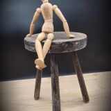 Massive black tripod stool