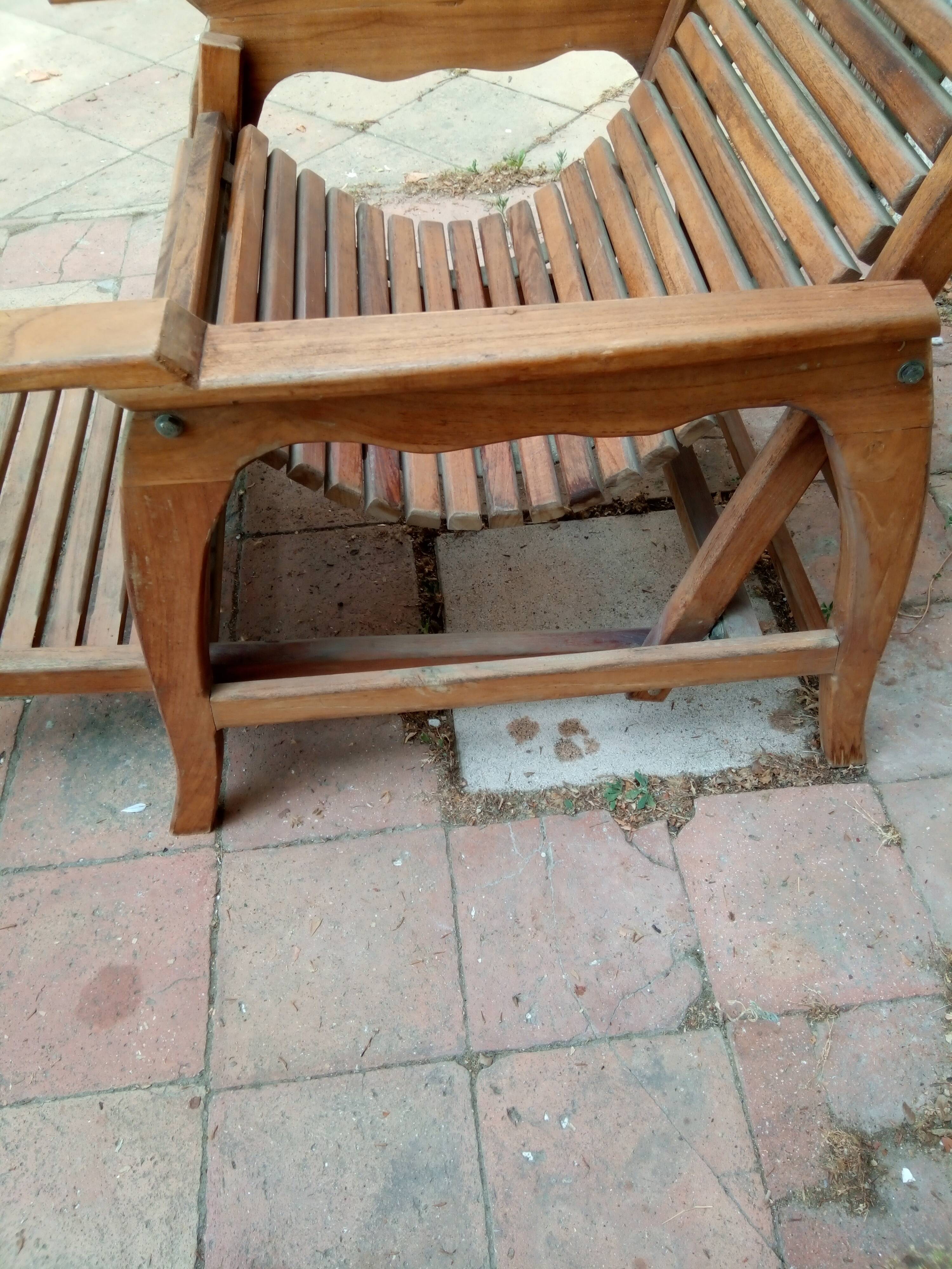 Teak stretchy long chair.