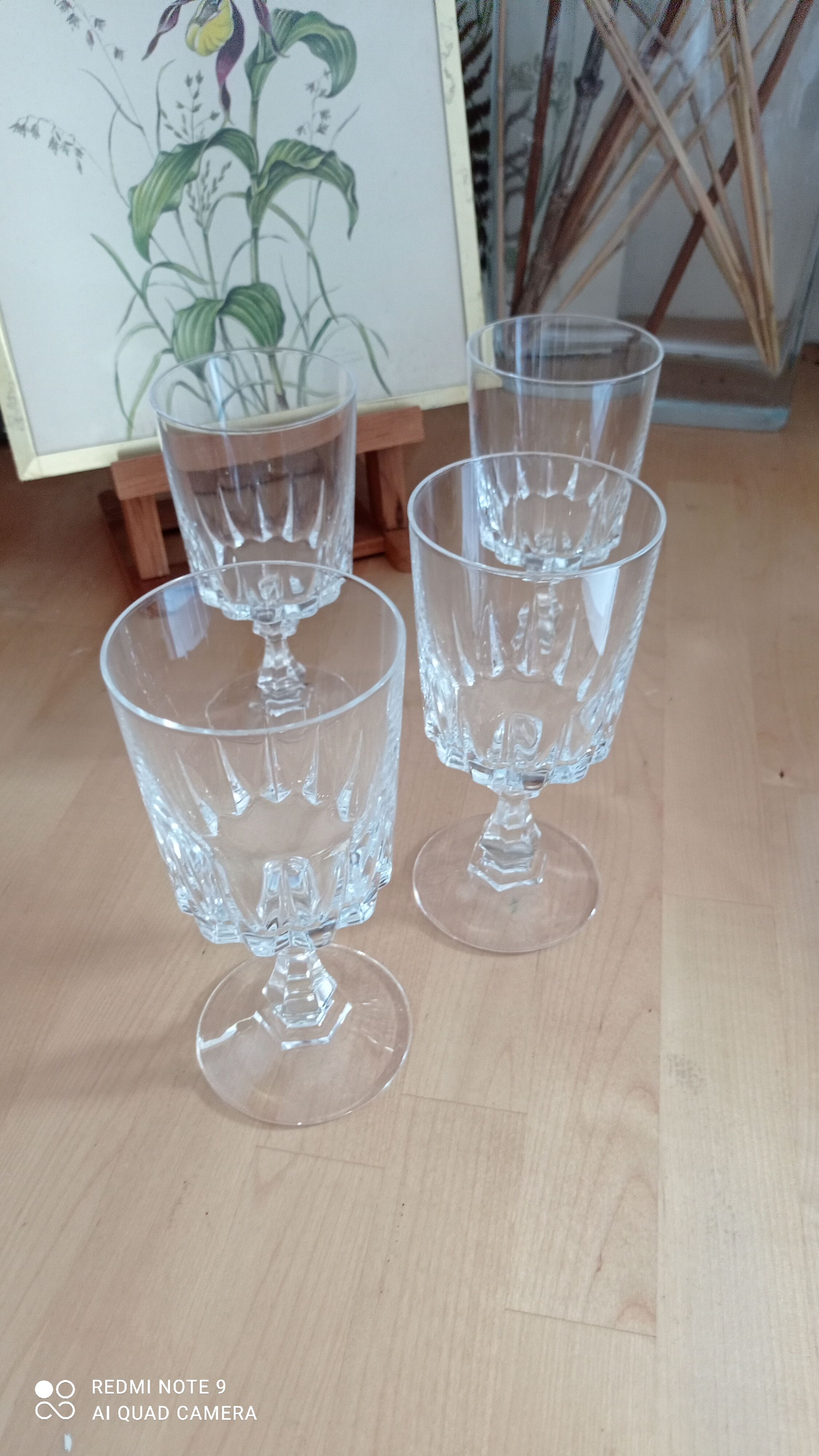Set of four old foot glasses