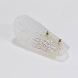 A mid-century Kalmar wall lamp in brass and textured glass, Austria, 1950s.