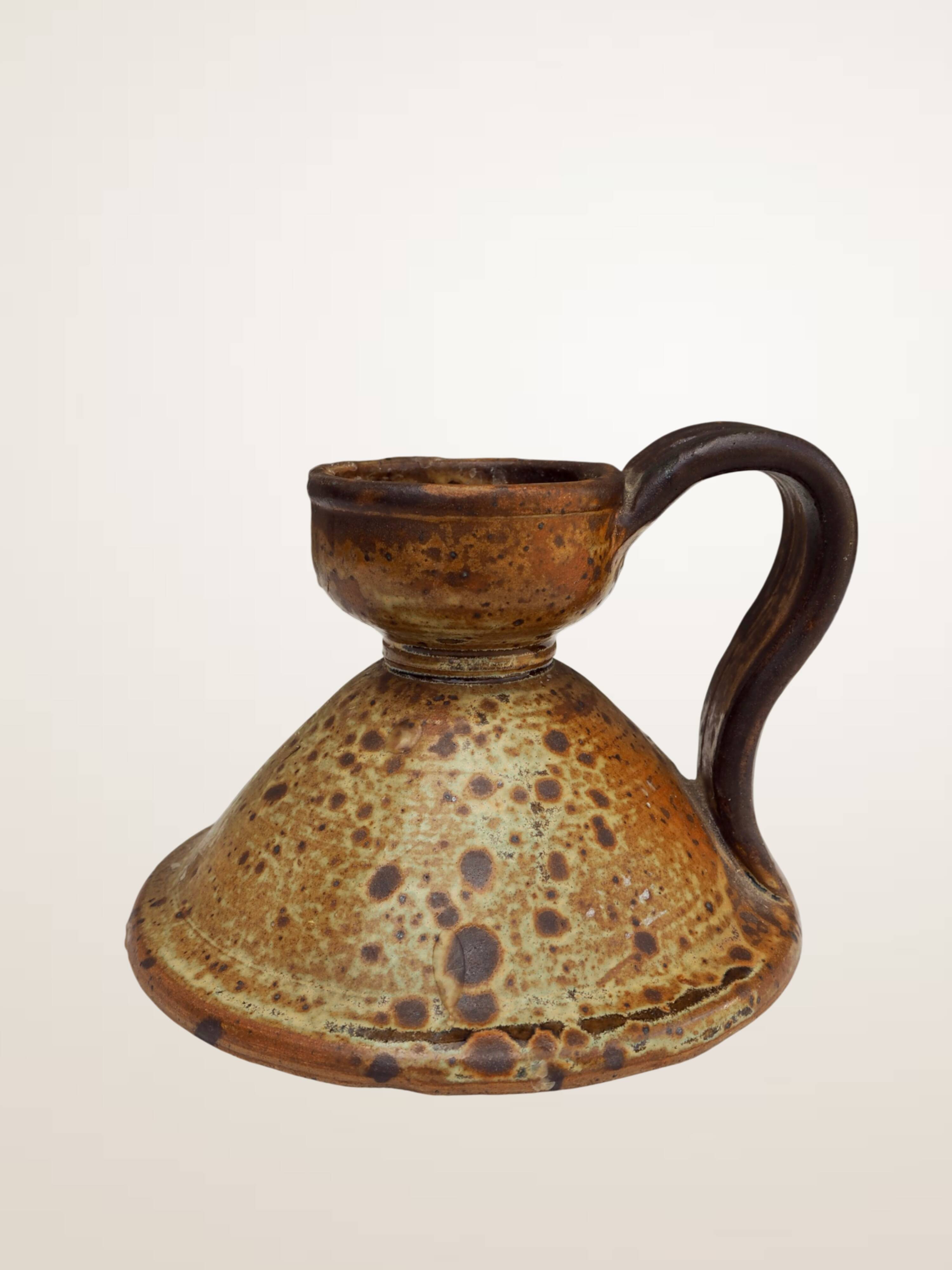 Handcrafted stoneware candle holder