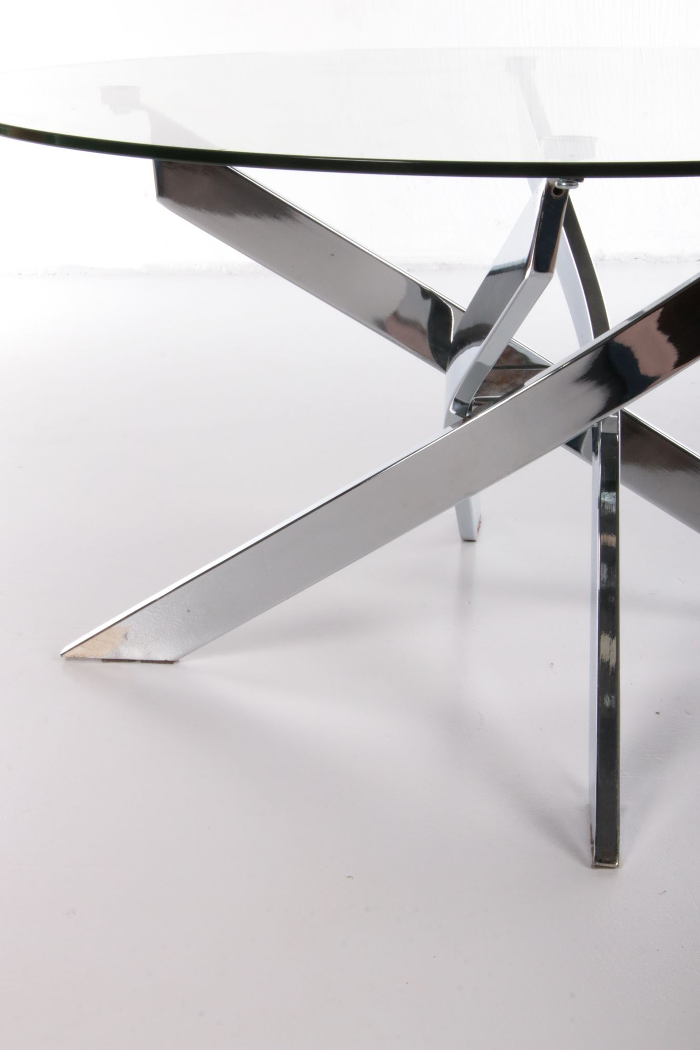 Vintage chrome coffee table with X frame and round glass top, 1980s