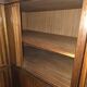 Modular corner library Oscar from the 1960s with sliding doors.
