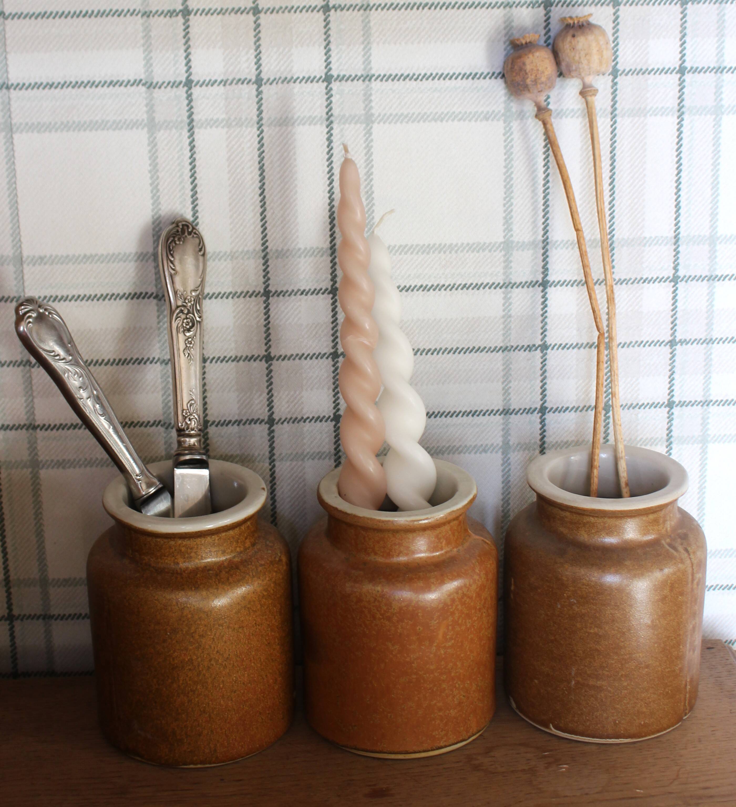 A set of 3 vintage glazed stoneware vases for indoor use.