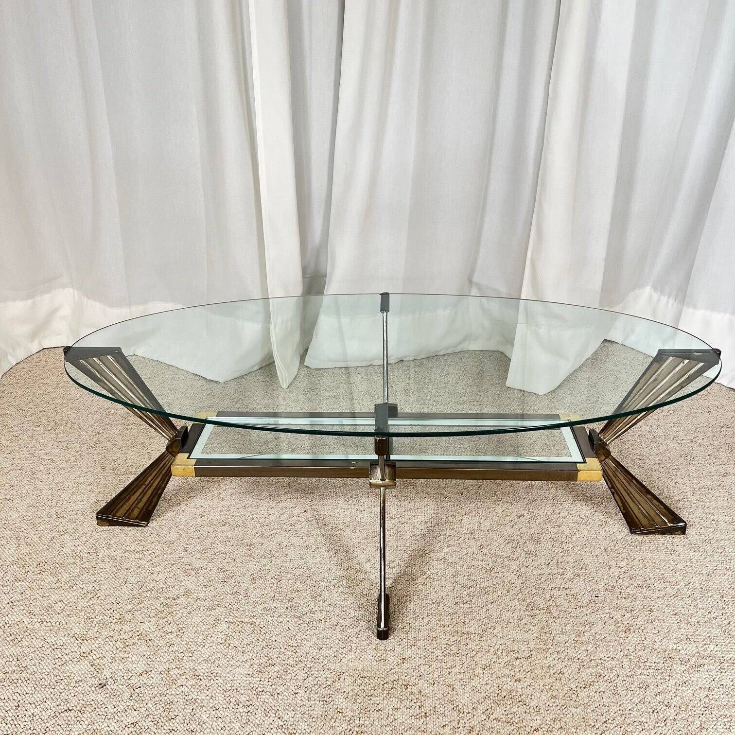 Vintage Italian coffee table in glass, chrome and brass metal, Hollywood Regency style, 1970s.