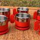 6 red cups and saucers from the Italian brand 'Morinos'.