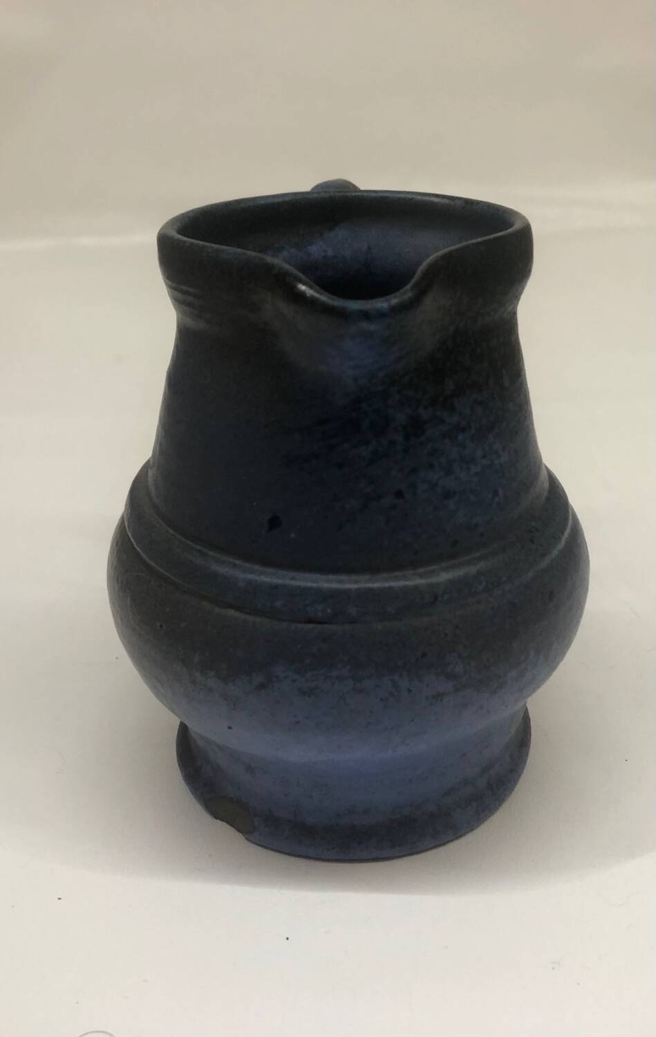 Ceramic pitcher by Roland Tostivint