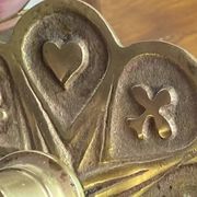 Handheld candlestick in bronze, card game decoration