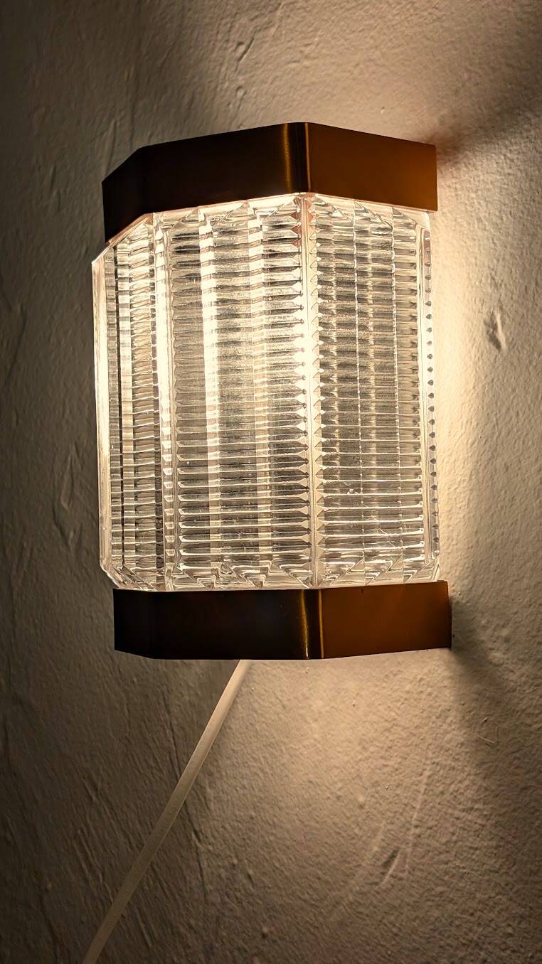 Scandinavian wall lights in copper and pressed glass