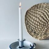 Old enamelled metal candlestick