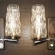 Pair of wall lights from the 1950s-1960s with a push button switch.