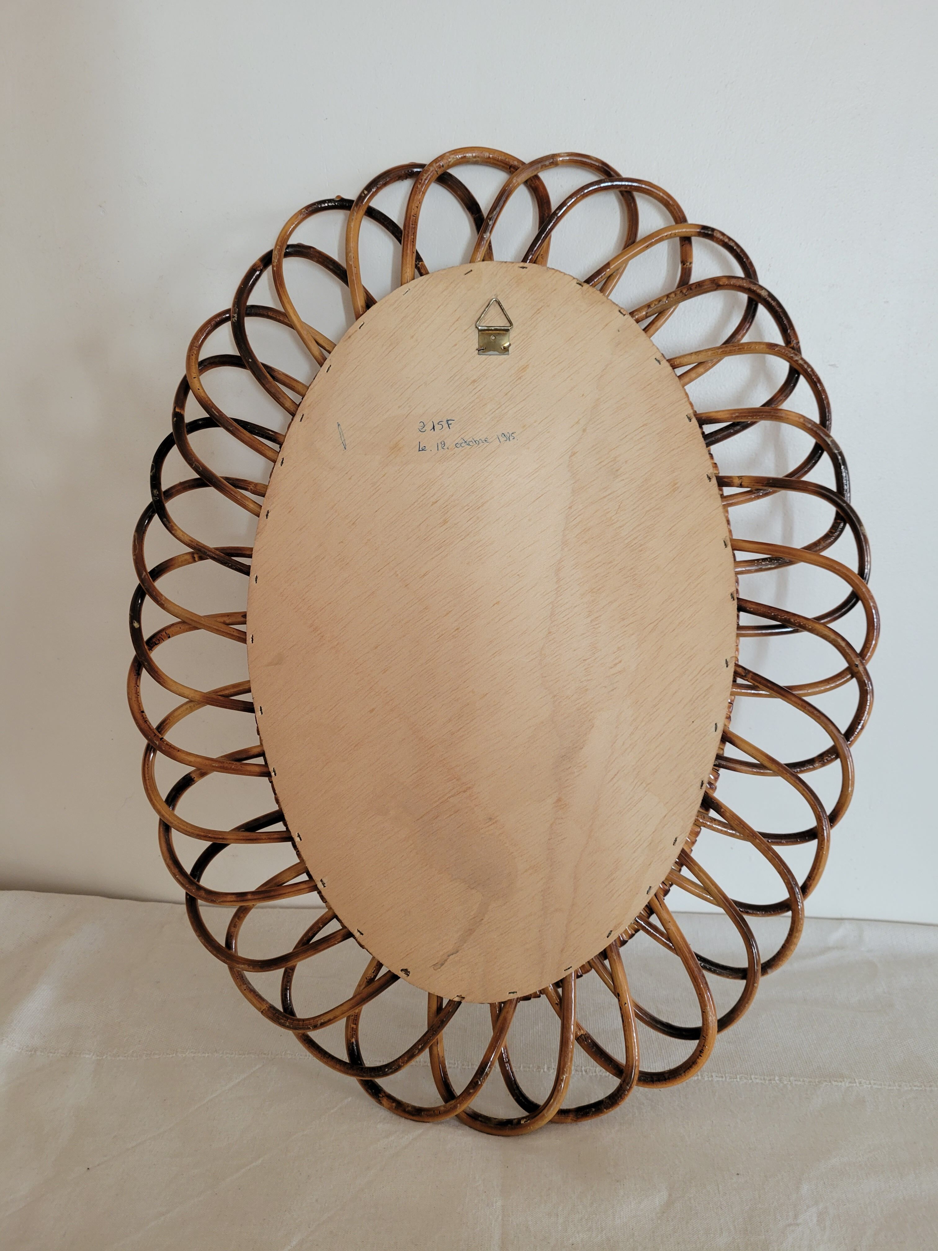 Oval rattan mirror 51 x 40 cm