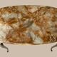 Table basse ovale en onyx et laiton 1950