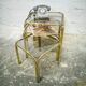 Trio of gilded metal trundle tables