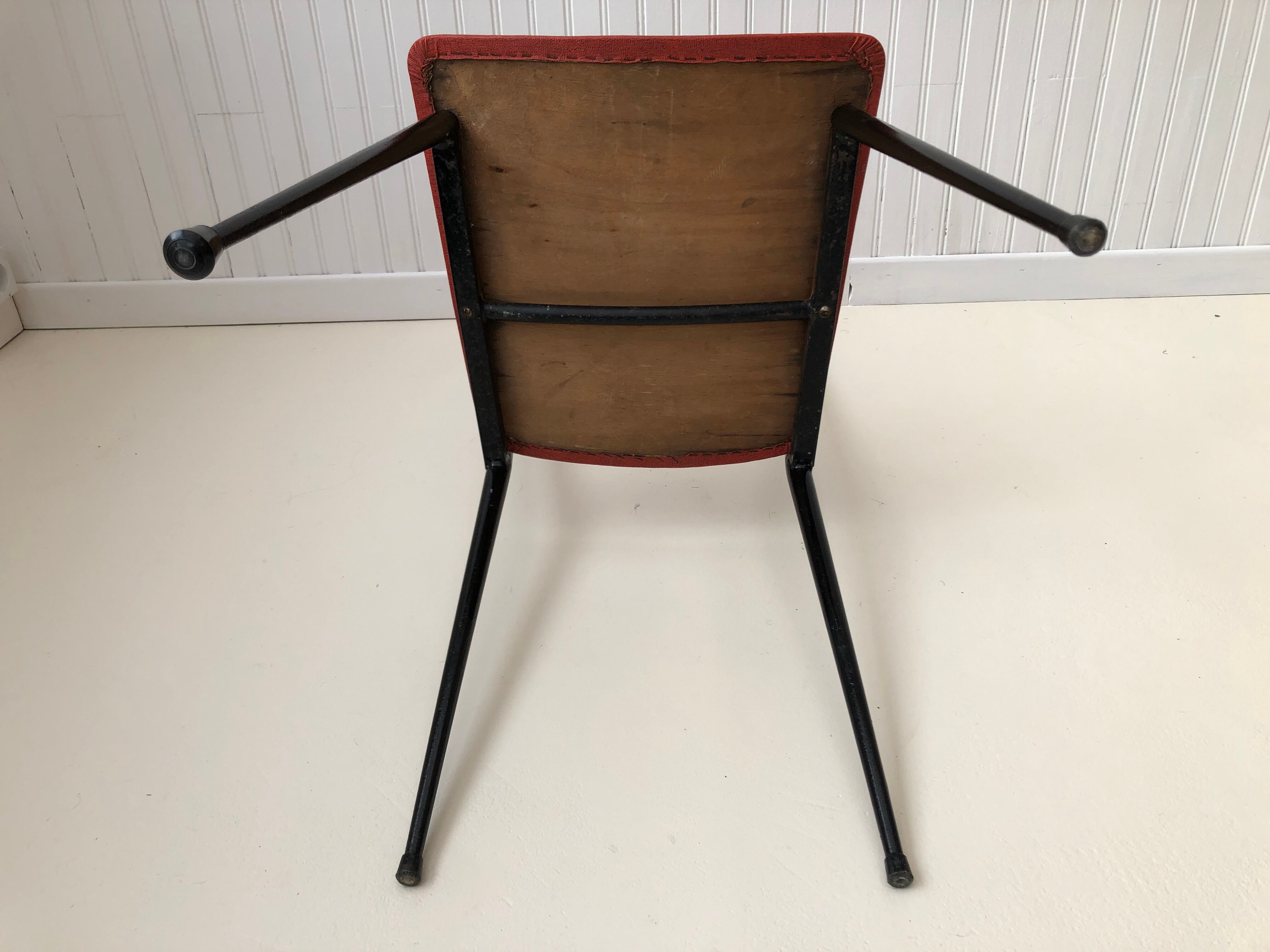 Red metal chairs from the 60s