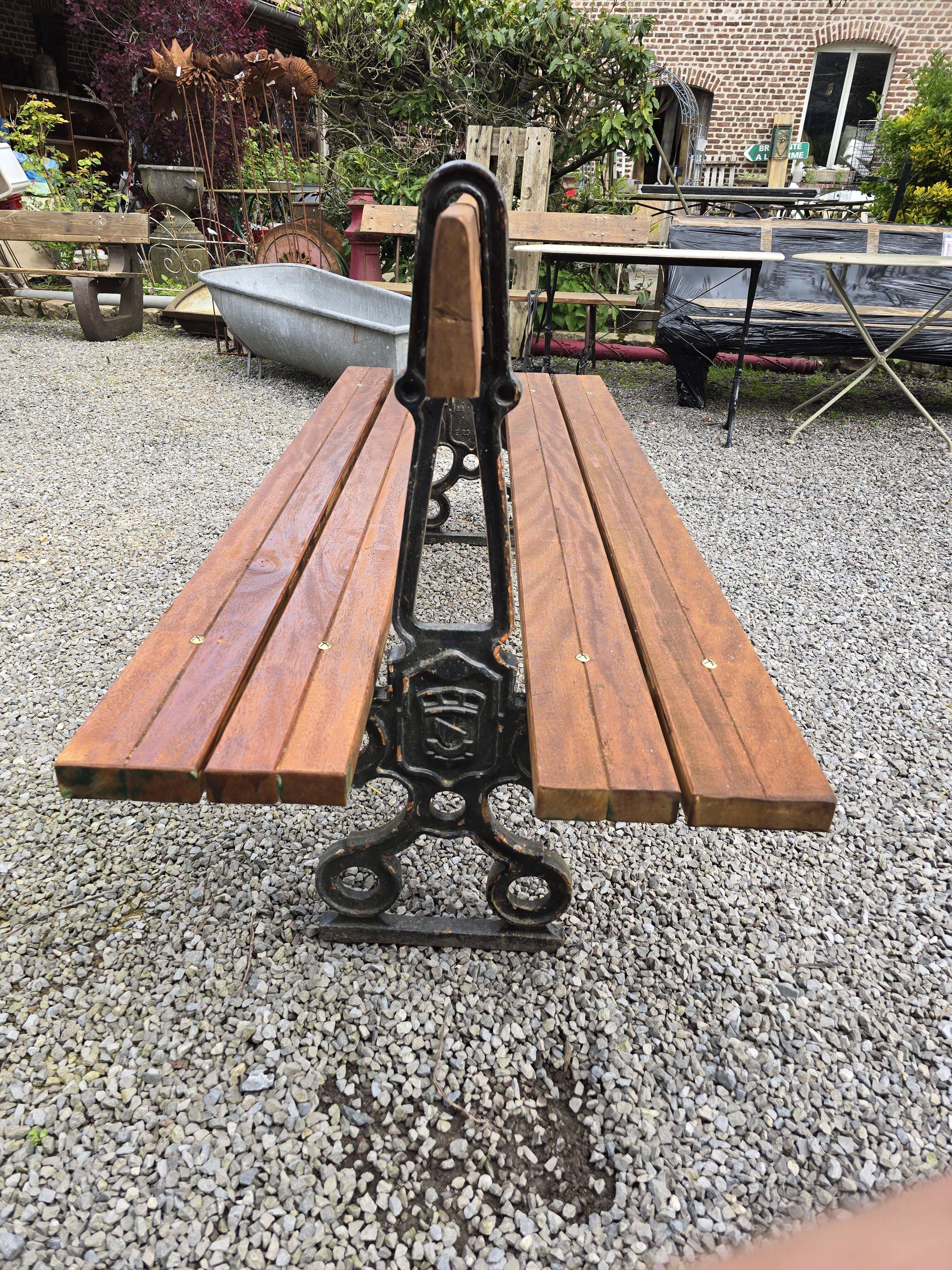 Public garden bench in the city of Paris