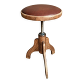 Vintage French wooden adjustable stool with a faux leather seat, 1960s.