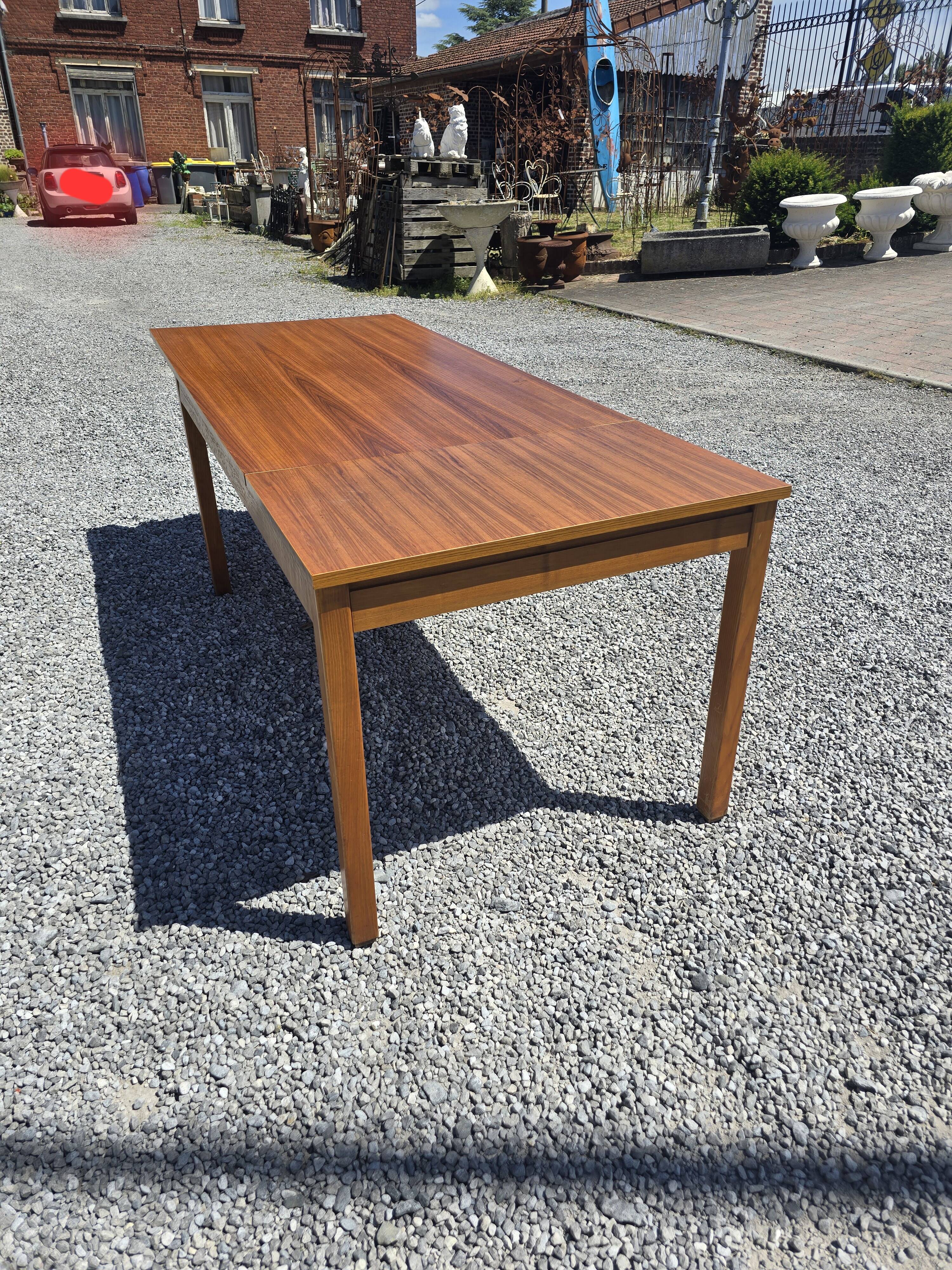 Scandinavian extendable teak table from the 60s