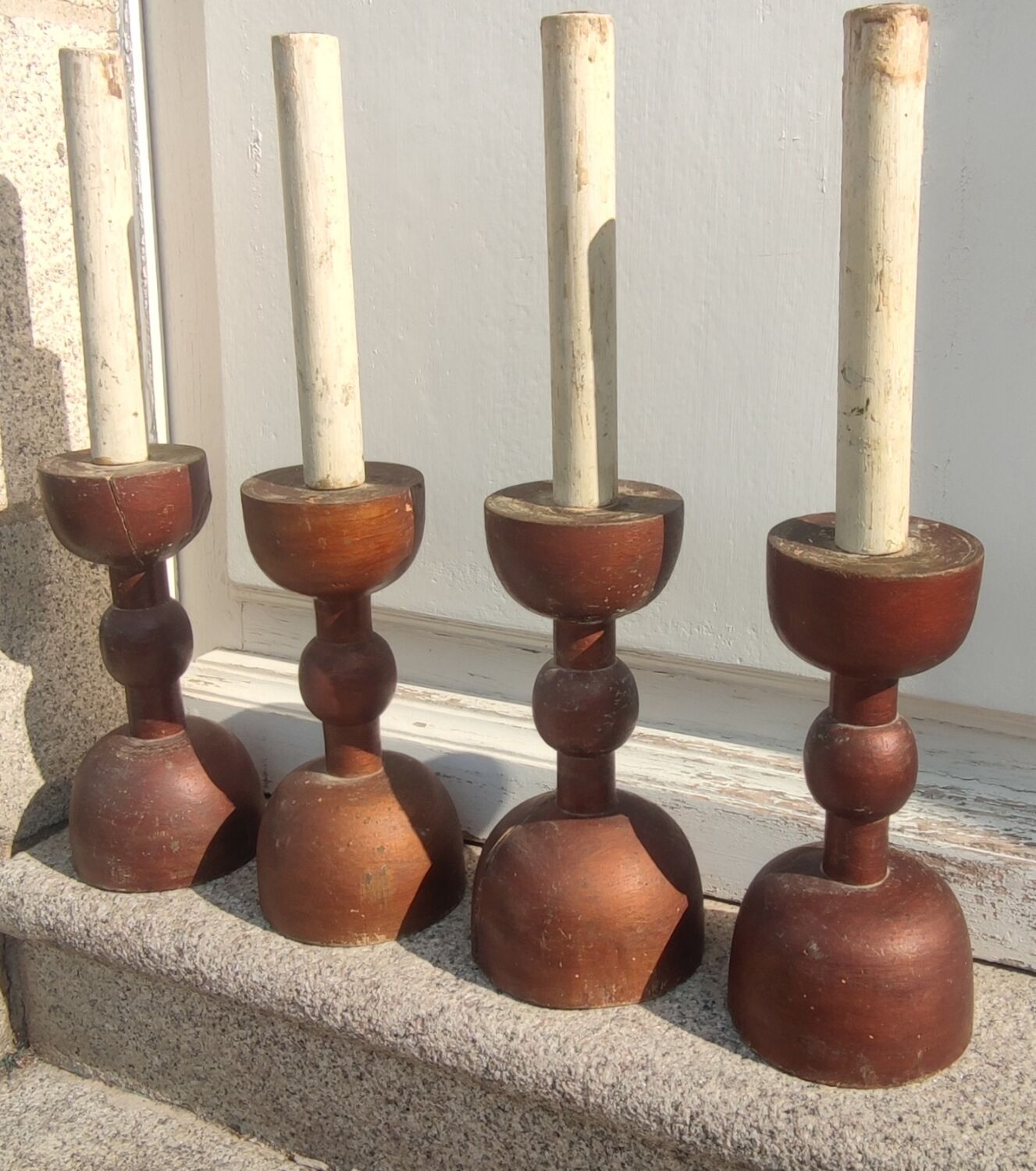 Series of 4 old large wooden candlesticks/brutalist