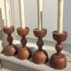 Series of 4 old large wooden candlesticks/brutalist