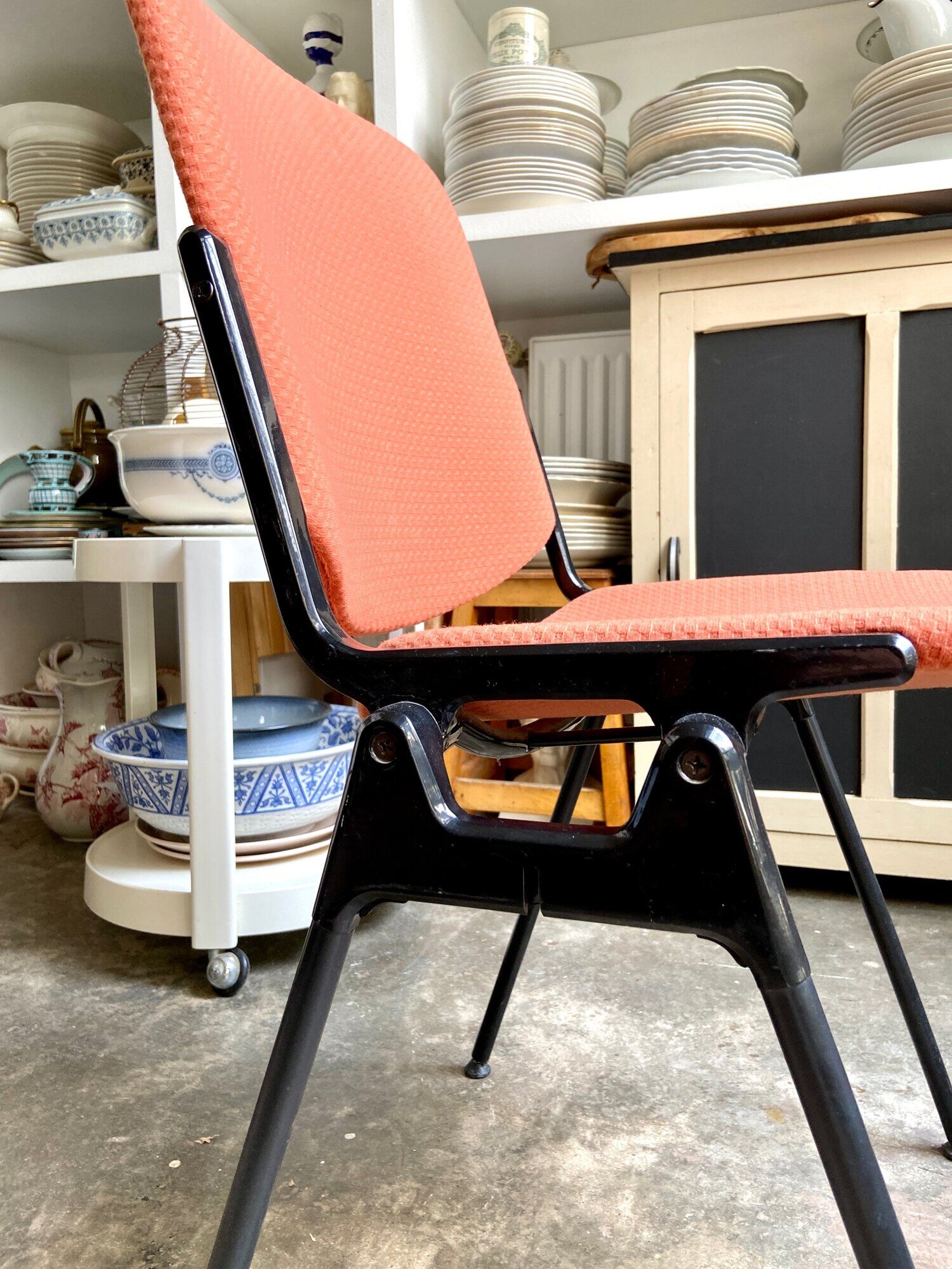 Peach cotton and black metal chair, 1960s