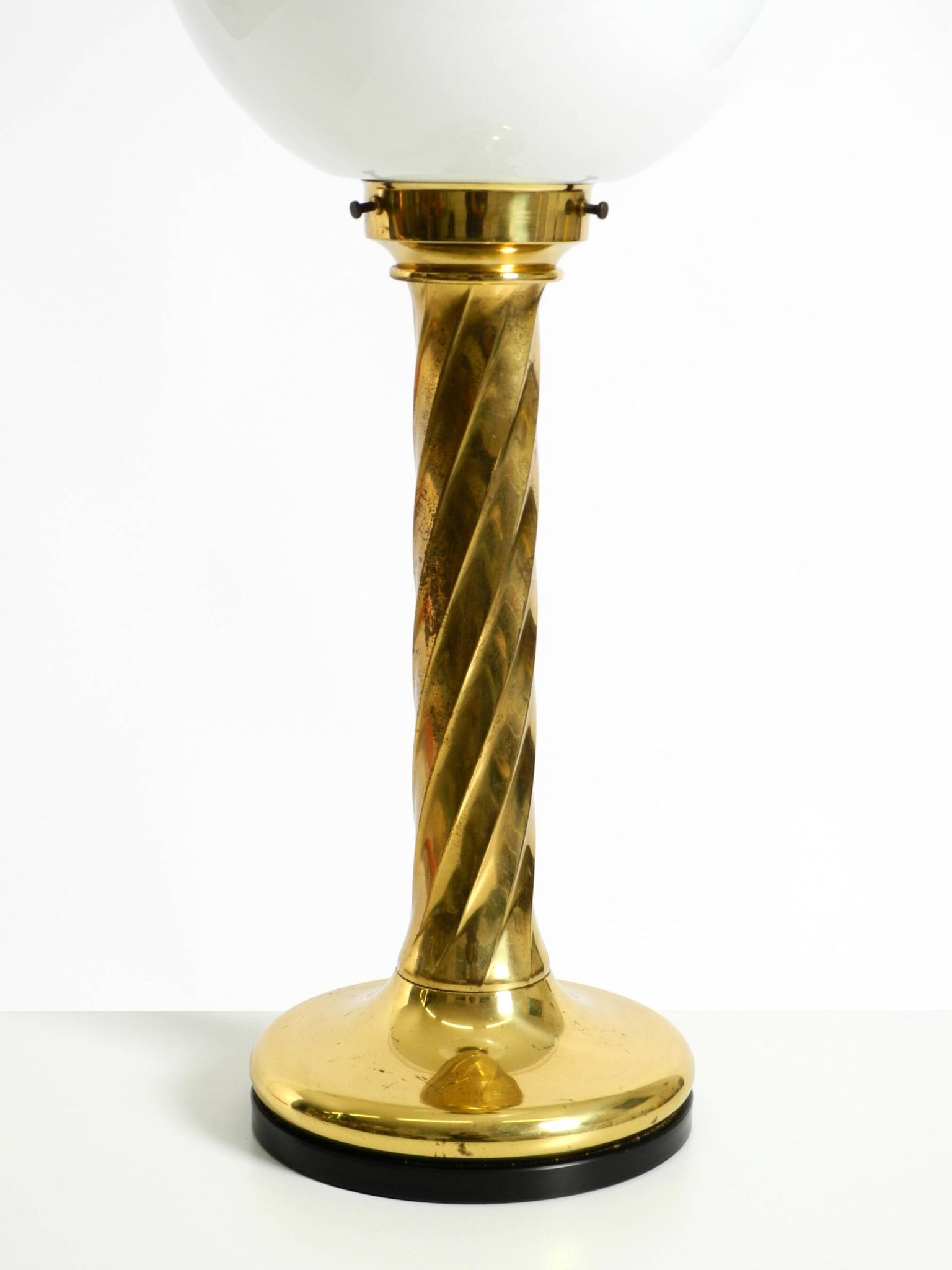 Large 1960s brass column-style table lamp with frosted glass globe