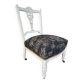 Chauffeuse basse sur roulettes style Napoléon III