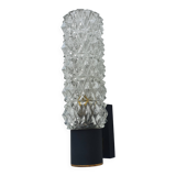 Black wall light with structured glass in Arlus style