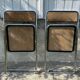 Pair of vintage metal caned folding chairs