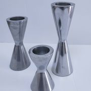 three "diabolo" aluminium design candle holders 90